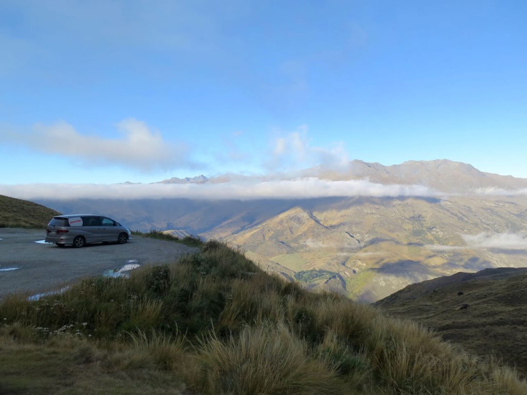 The Toyota Estima van we rented to travel New Zealand for months, parked overlooking the mountains. ©KettiWilhelm2016