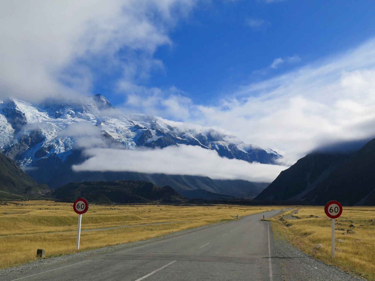 A few clouds and mostly blue sky on the road to Mount Cook, New Zealand. ©KettiWilhelm2016