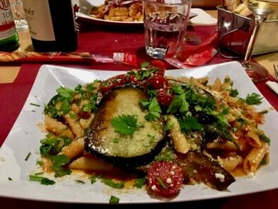 A heavy plate of pasta with fried eggplant in Sicily. (This Italian menu guide will help you know what you're getting into before ordering dinner in Italy.) ©KettiWilhelm2017