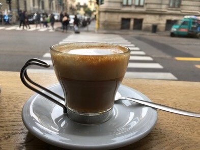 A caffè macchiato (espresso drink "marked" with milk foam) at a bar in Milan. (Breakfast is the easiest Italian meal in this guide.) ©KettiWilhelm2017