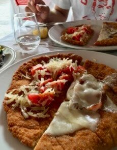 How to try as many menu items as possible in Italy? Split two with a friend, like these two styles of Cotoletta alla Milanese. ©KettiWilhelm2017