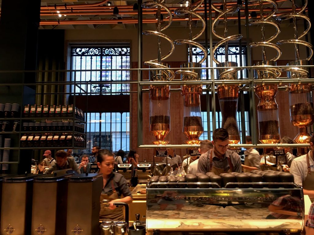 Beautiful, metallic espresso machines in the first Starbucks in Italy. ©KettiWilhelm2018