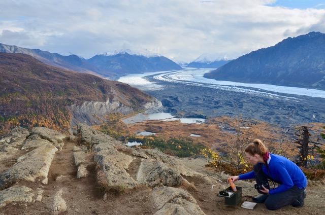 The author of this travel blog on a hike in Alaska, with a glacier in the background.  ©KettiWilhelm2019