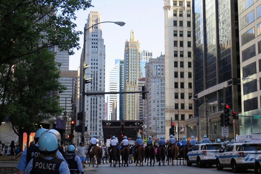 Police lined up on horseback on Chicago's Michigan Avenue, during protests over George Floyd's death. ©KettiWilhelm2020