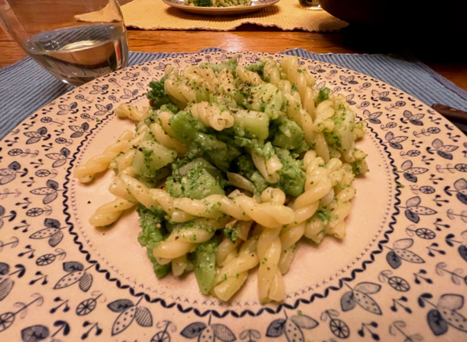 A close-up of a plate of homemade, Italian Pasta with Broccoli from an authentic, family recipe, on a blue and white plate. ©KettiWilhelm2021