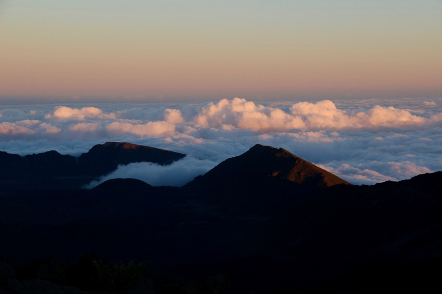 The pink light of the sunset on the clouds from the top of the Haleakala volcano, on Maui. ©KettiWilhelm2021