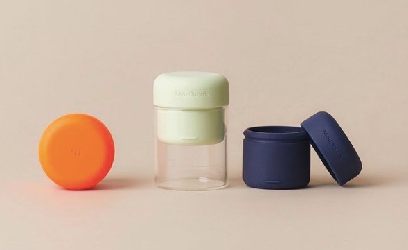 byHumankind's refillable, plastic-free mouthwash tablet container – made of glass and silicone. (Image courtesy of byHumankind.)