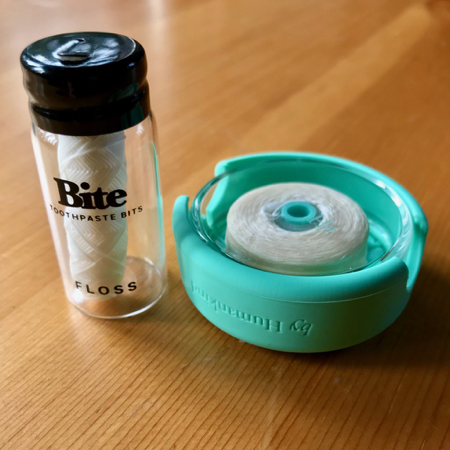 On the left: Bite's refillable floss container (a vertical design). On the left: byHumankind's refillable floss container, which is similar to a normal, disposable floss container. ©KettiWilhelm2021