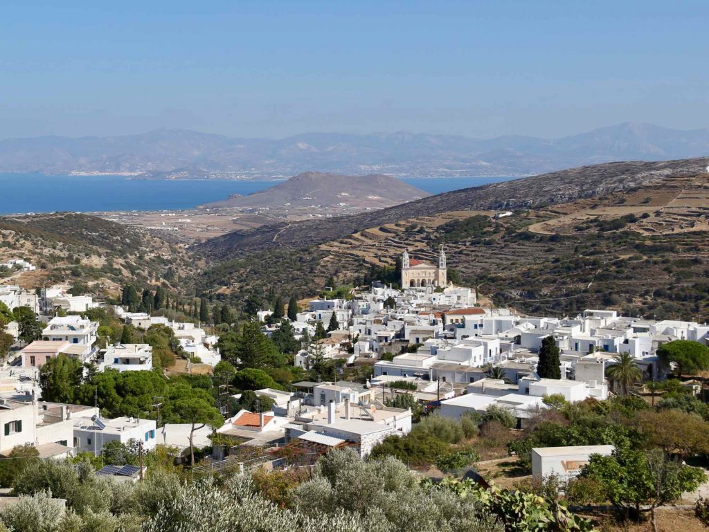 A wide view of the white-washed town of Lefkes, on the Greek island of Paros, which is becoming a more sustainable travel destination through the NGO Clean Blue Paros. ©KettiWilhelm2021