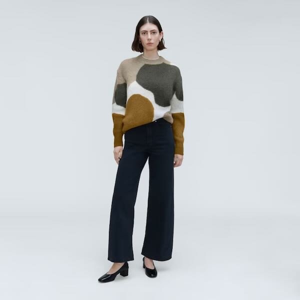 Everlane alpaca crew sweater on a model – a top sustainable gift idea.