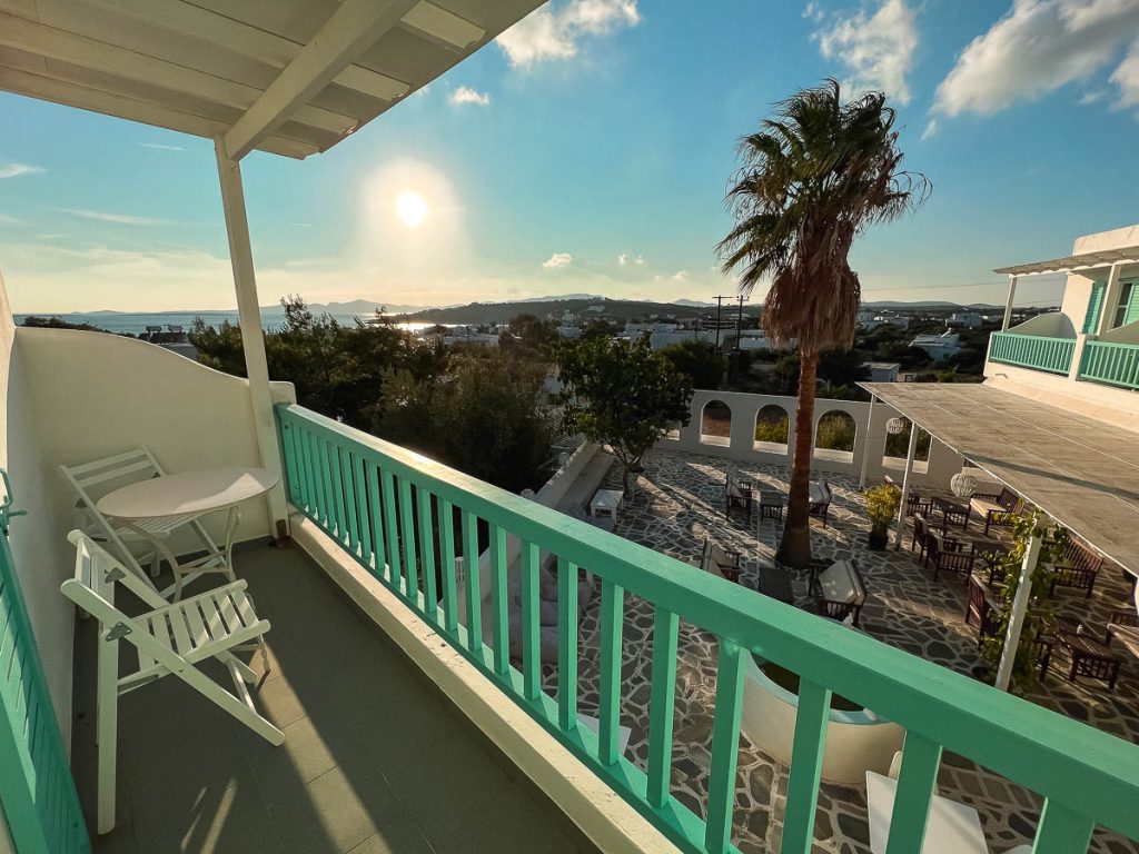 The view toward the sunset over the town of Aliki, from a balcony at Paros’ Aliki Panorama Hotel. ©KettiWilhelm2022