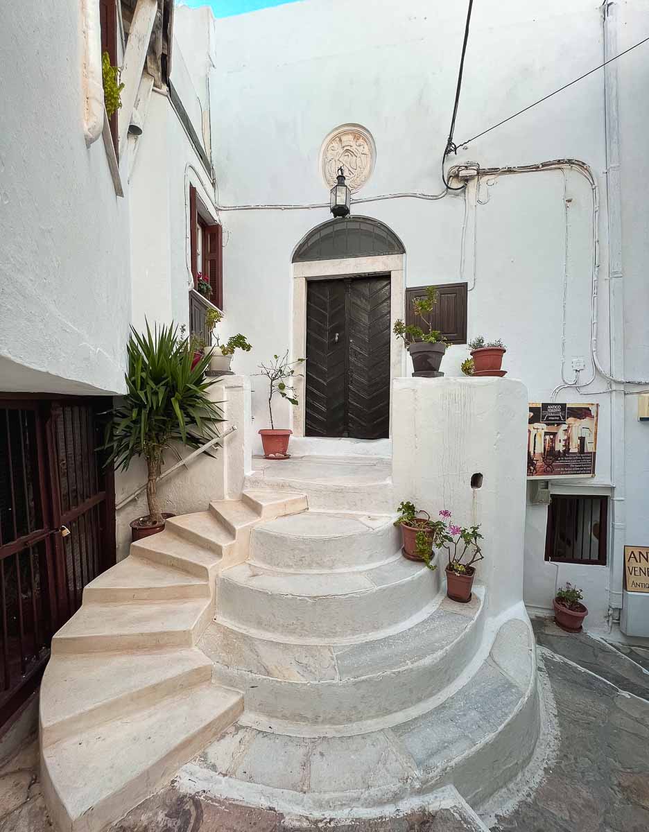 A decorative double spiral staircase in Naxos’ Old Town, Greece. ©KettiWilhelm2022
