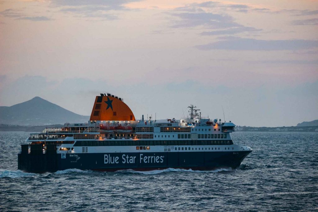 The Blue Star ferry leaving the port of Naxos, Greece, with the sunset behind it. ©KettiWilhelm2022