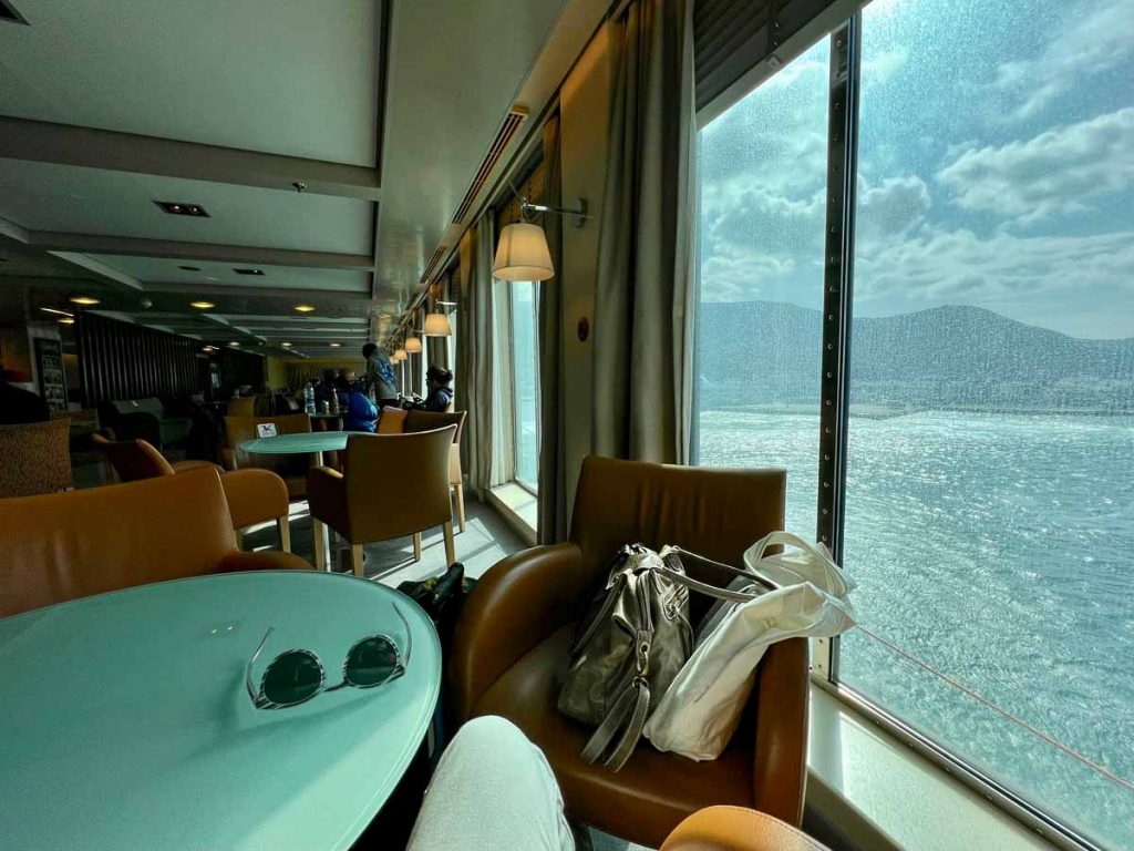 Looking out the window from a lounge seat on a BlueStar ferry in Greece, traveling from Paros to Naxos. ©KettiWilhelm2022