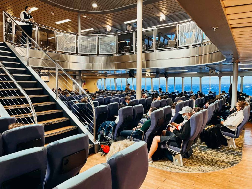 The interior, second-class seating on the SeaJets Champion 2 ferry, while traveling from Naxos to Athens, Greece. ©KettiWilhelm2022