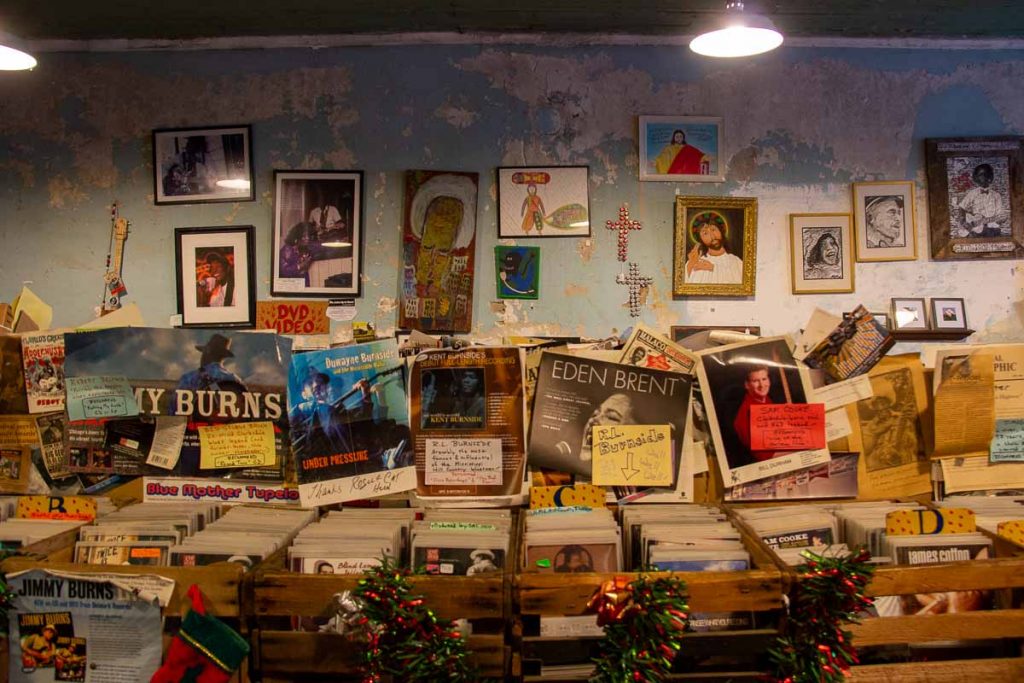 Boxes of Blues records and walls covered in crosses and other knick-knacks at the Cat Head blues store in Clarksdale, Mississippi. ©KettiWilhelm2022