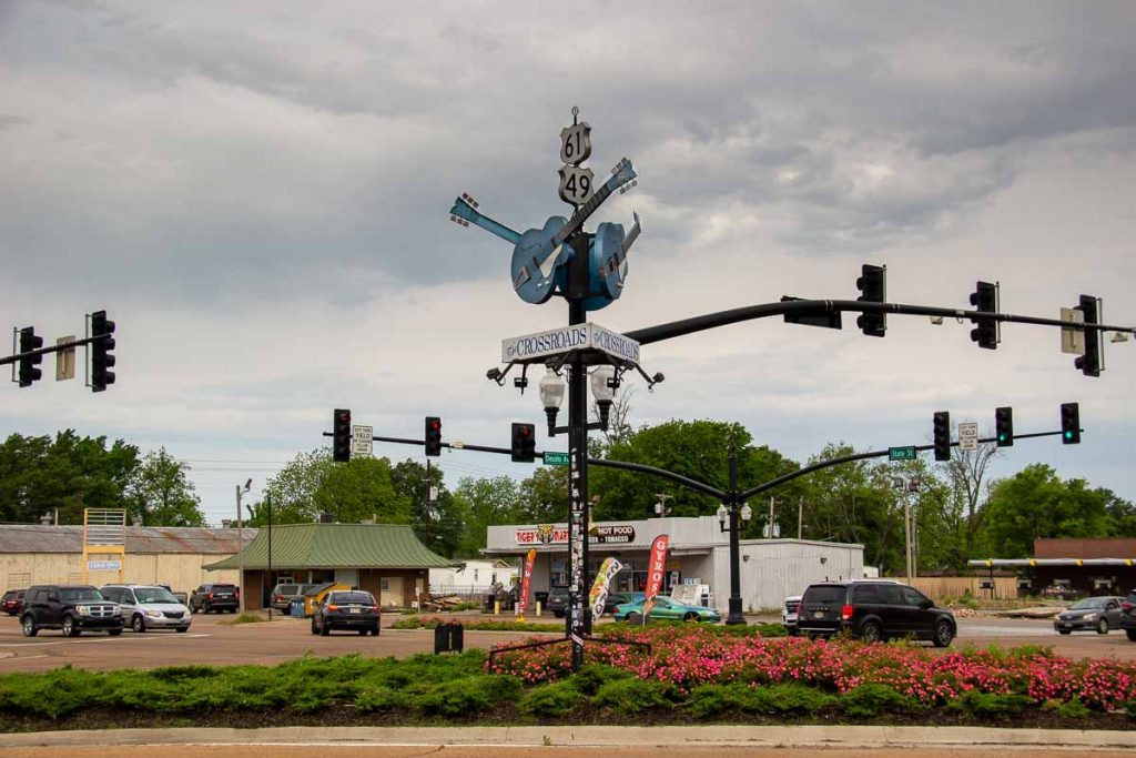 The intersection of Highways 49 and 61, a famous stop on the Mississippi Blues Trail, in front of a gray sky on the outskirts of Clarksdale, Mississippi. ©KettiWilhelm2022
