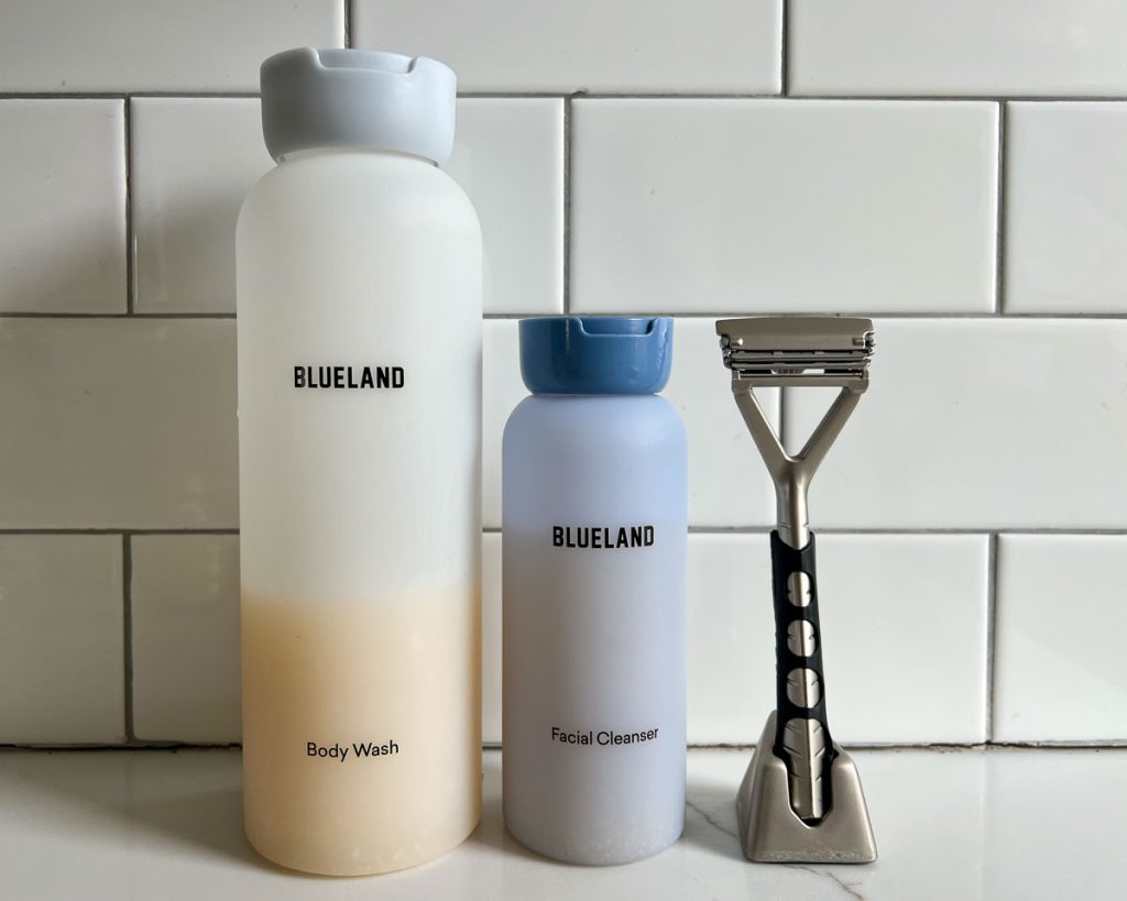 My reusable, silicone Blueland bottles of body wash and refillable face wash, next to my plastic-free Leaf razor. ©KettiWilhelm2023