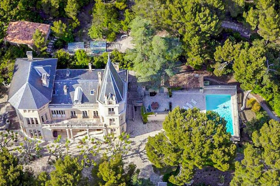 Aerial view of a sustainable castle to rent from group travel in Southern France from the vacation rental website Oliver's Travels.