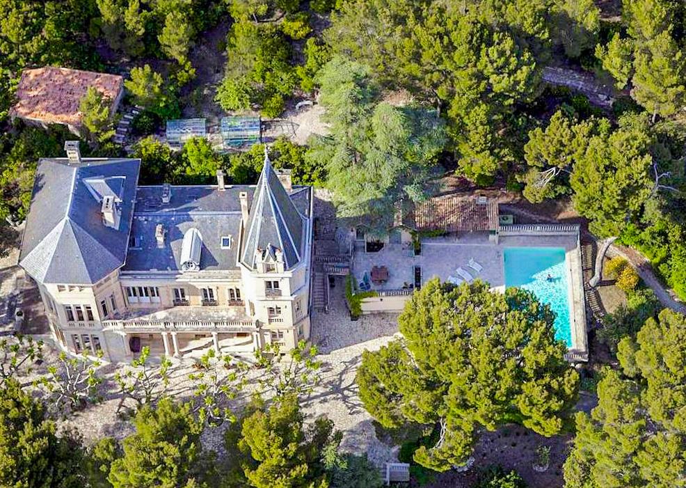 Aerial view of a sustainable castle to rent from group travel in Southern France from the vacation rental website Oliver's Travels.  