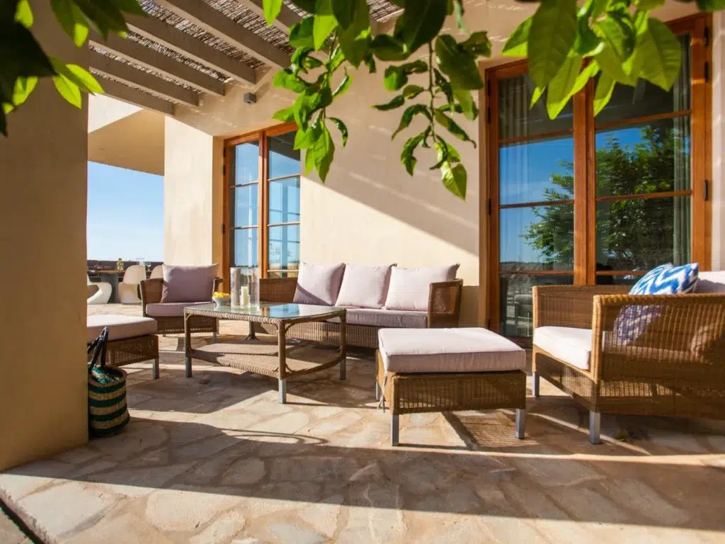 A sun-drenched patio at this sustainable villa for rent in Mallorca, Spain.