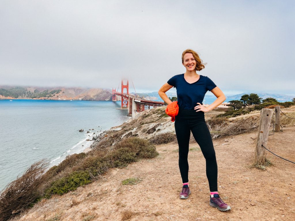 Wearing my Unbound Merino leggings on a hike in San Francisco, in front of the Golden Gate Bridge. ©KettiWilhelm2022