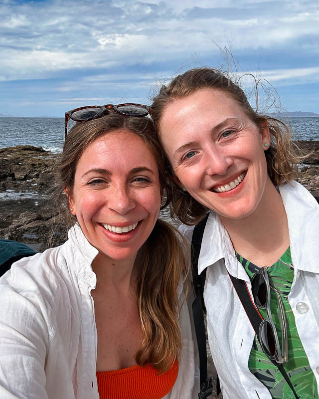 The top items on both of our Baja packing lists: White linen shirts, which we're wearing here on a rocky beach in the Gulf of California. ©KettiWilhelm2023