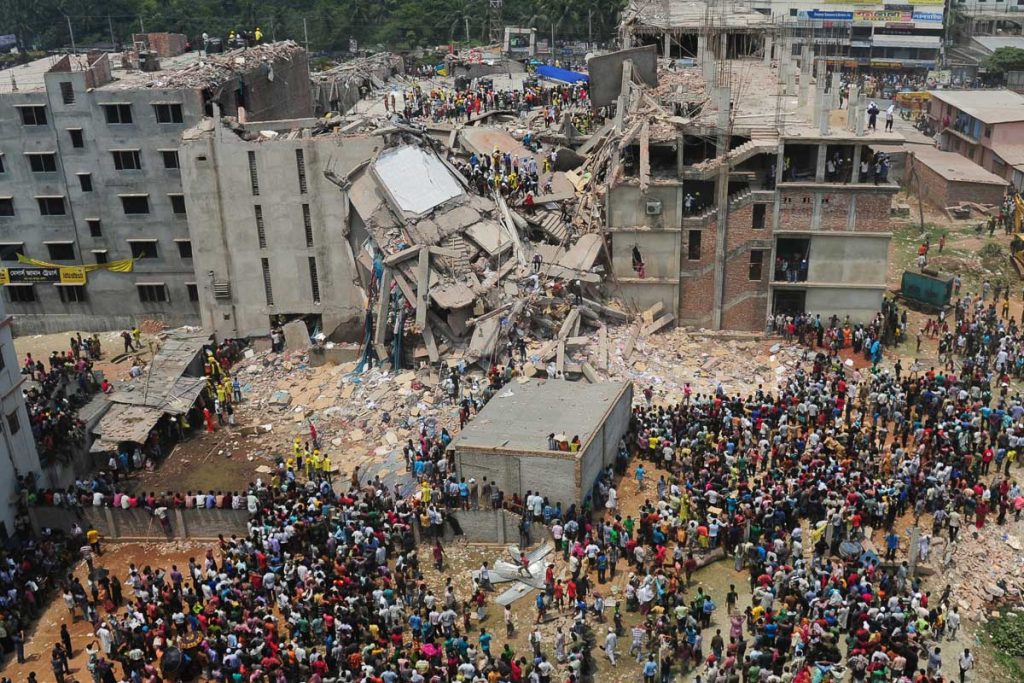 An aerial shot of the collapsed clothing factory at Rana Plaza, Bangladesh, which sparked a movement of sustainable and ethical clothing brands. 
