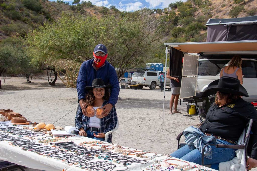 The Romero family, who has been working with UnCruise for years, selling their locally hand-made jewelry and crafts for UnCruise travelers. ©KettiWilhelm2023