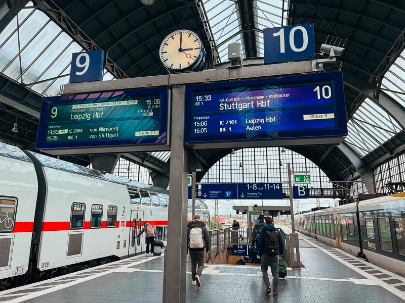 The train station in Karlsruhe, Germany, with the platform sign showing trains to Stuttgart and Leipzig, Germany. ©KettiWilhelm2023