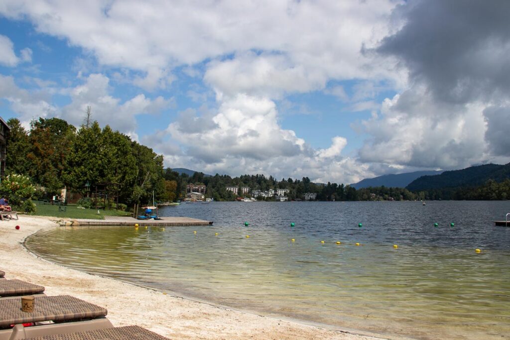 The white sand beach at the Golden Arrow Lakeside Resort is made of crushed limestone and helps fight the effects of acid rain in the Adirondack region. ©KettiWilhelm2023