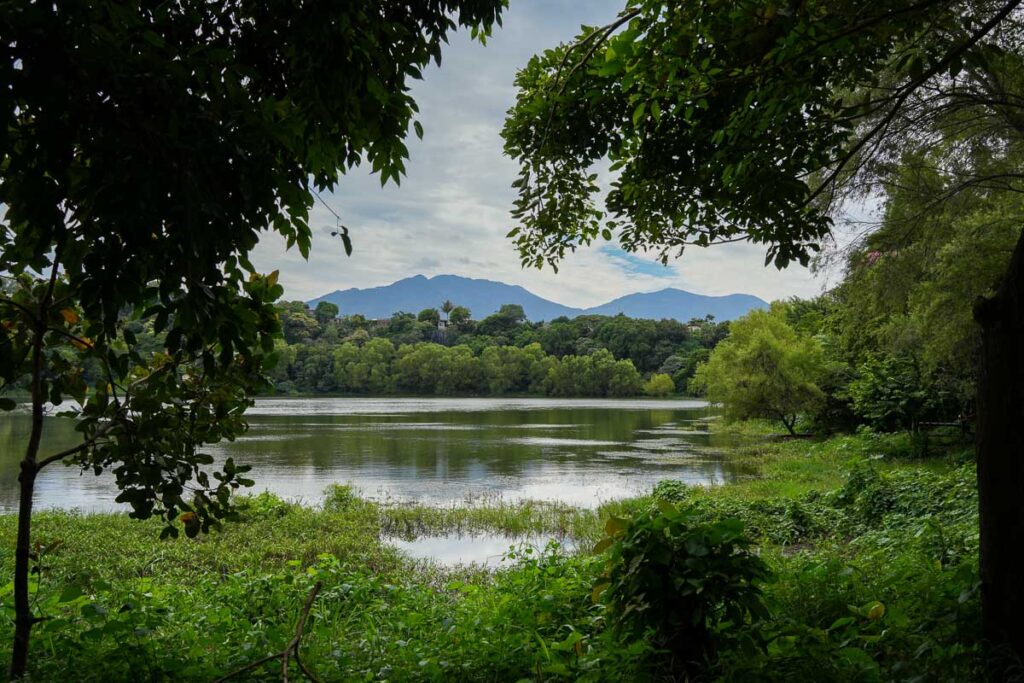 A small sinkhole pond, or cenote, in Chalchuapa, the town that is home to the Tazumal Mayan site in El Salvador. ©KettiWilhelm2023