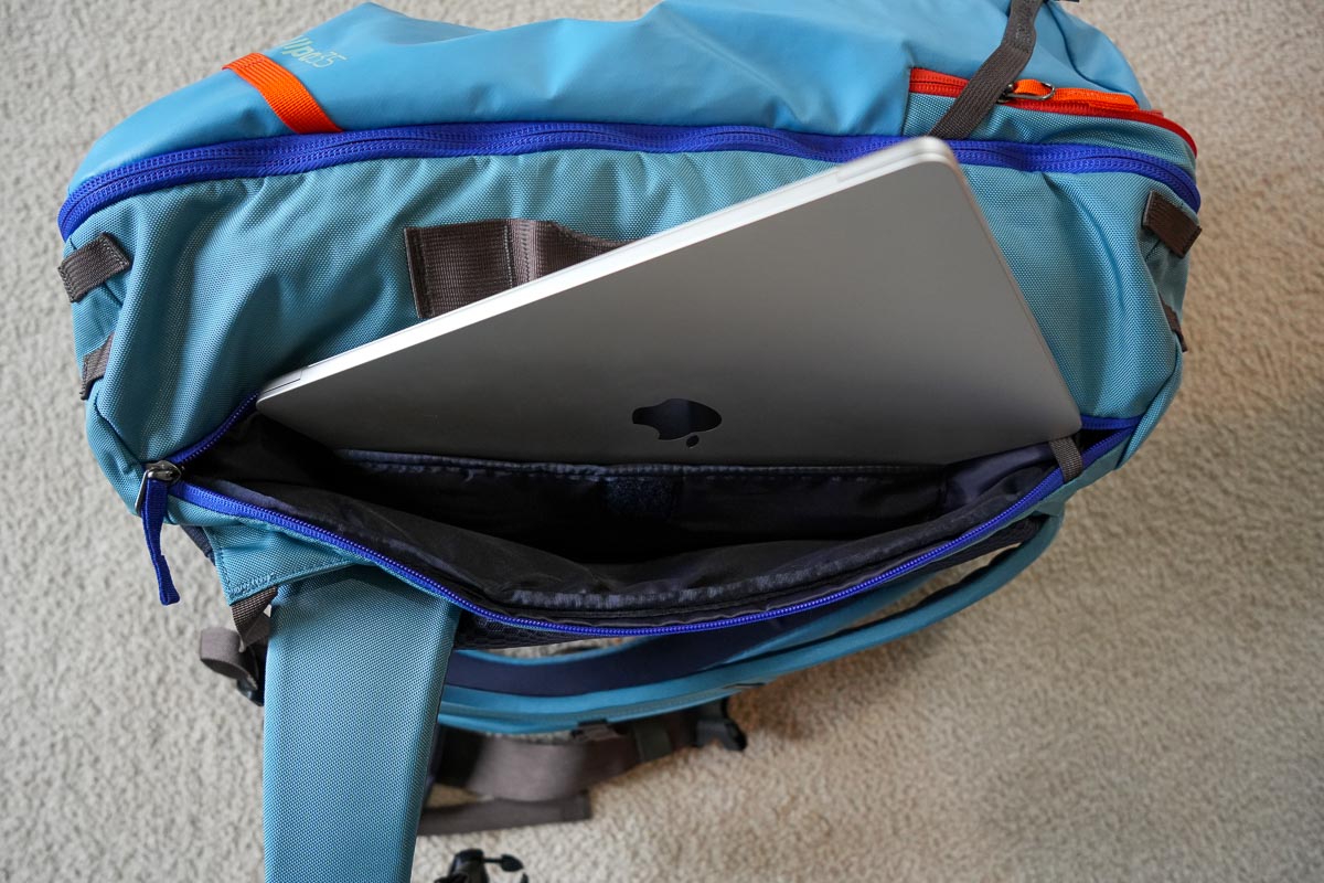 The separate, padded laptop compartment on the Cotopaxi Allpa fits a laptop and tablet, but the laptop doesn’t fit inside the backpack’s smaller and safer pocket (which also is not lockable). ©KettiWilhelm2023