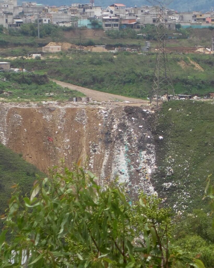 A hillside in rural Guatemala in 2010 covered in garbage, where locals were dumping their plastic and other trash directly into the forest. ©KettiWilhelm2023