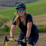 One of our Italy bike trip guests riding her gravel bike in the Marche region. ©KettiWilhelm2025