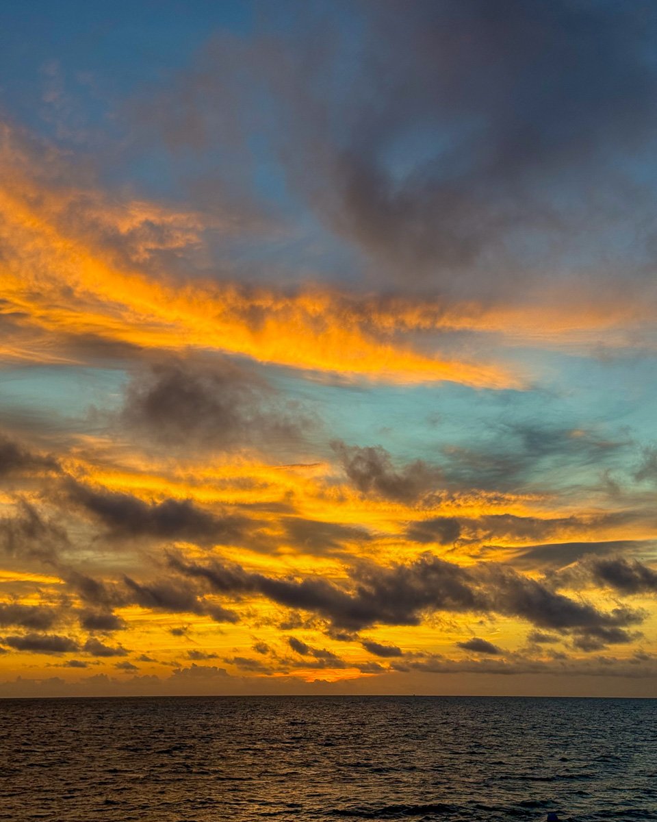 Orange clouds during a sunset over the Atlantic Ocean in Bermuda. ©KettiWilhelm2025