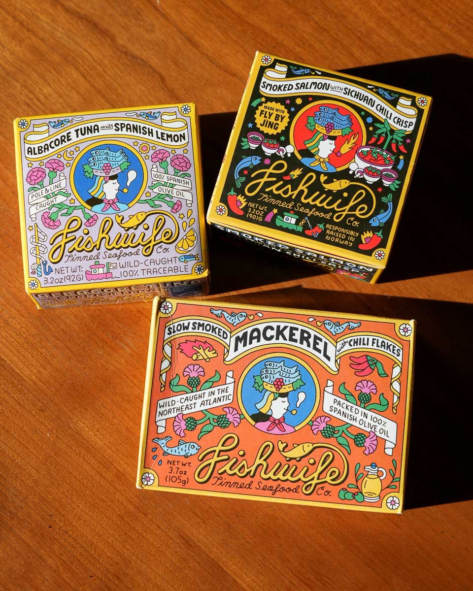 Sustainably caught tinned fish from Fishwife, in colorful, artfully decorated plastic-free packaging. ©KettiWilhelm2025