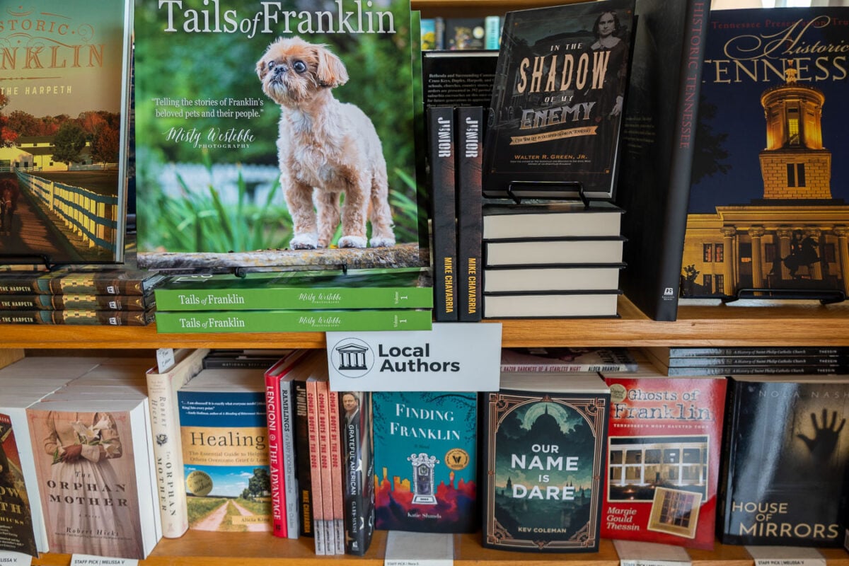 "Tails of Franklin," "Historic Franklin," "Historic Tennessee," "Finding Franklin," and other books by local Tennessee authors on a book shelf at the famous Landmark Booksellers book store in Franklin, Tennessee. ©KettiWilhelm2026