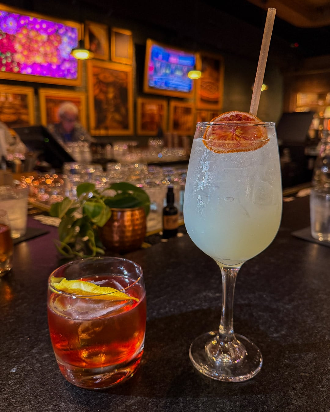 Two cocktails sit on the bar, one vodka, one whiskey, at the Leiper's Fork Distillery, in downtown Franklin, Tennessee. ©KettiWilhelm2026
