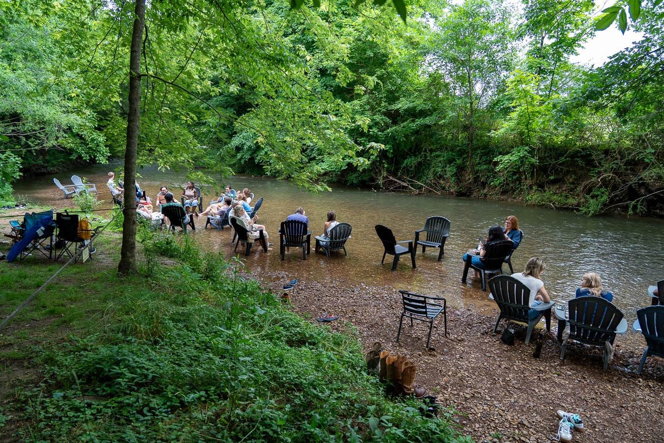 People sitting on lawn chairs drinking wine at Crown Winery Leiper's Fork. ©KettiWilhelm2026