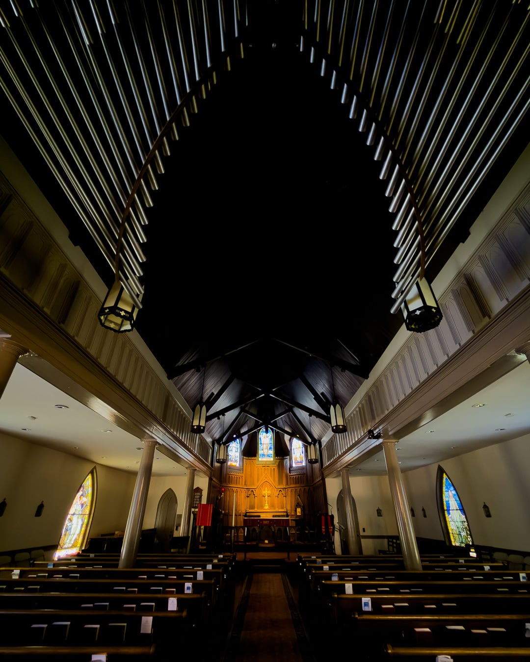 Organ and pews in the dark inside the historic St Paul's Episcopal Church in downtown Franklin, Tennessee. ©KettiWilhelm2026